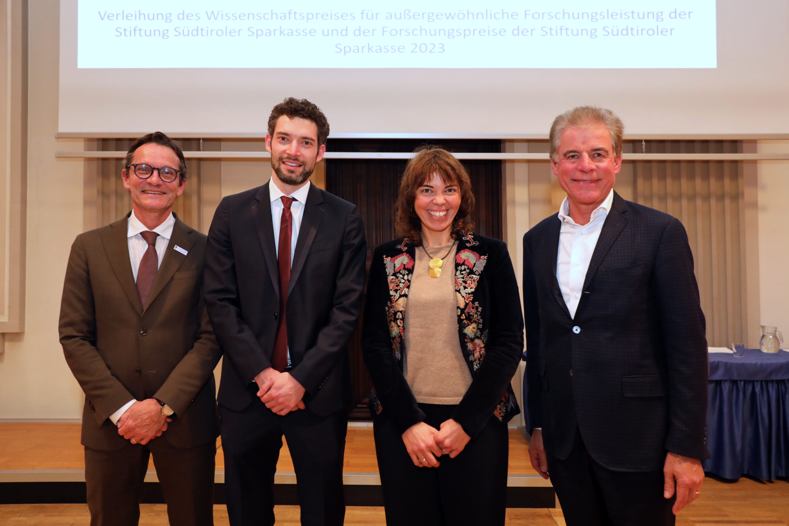 Vice-Rector Bernhard Fügenschuh and the President of the Foundation Konrad Bergmeister alongside Prize Science winners Hannes Pichler and Francesca Ferlaino.